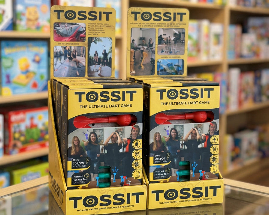 TOSSIT sticky darts displayed in a retail store