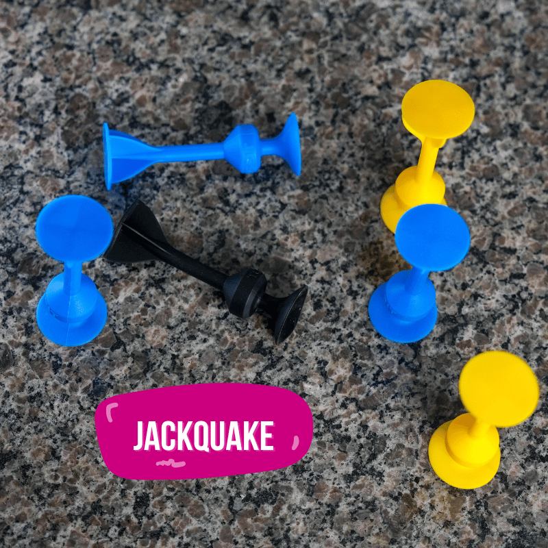 A dart knocking the black jack dart down while sticking itself