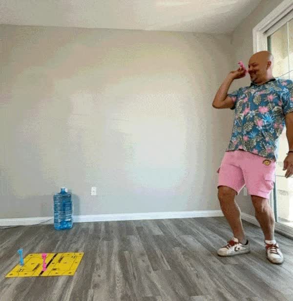 A standard forearm throw at a target straight ahead