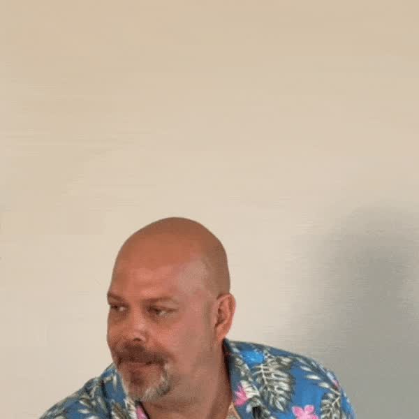 A dart landing on a bald head — the hardest target of all